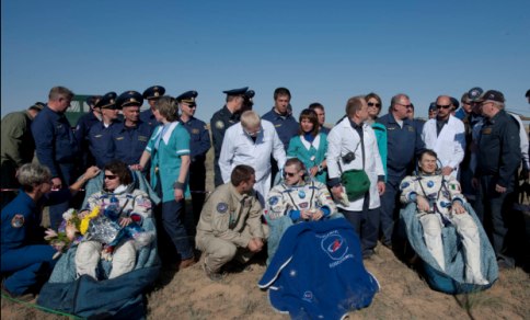 Cathenine, Dmitri and Paolo resting after landing Cathenine, Dmitri and Paolo resting after landing