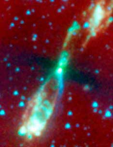 La estrella, en el centro de un disco aplanado emite poderosos chorros de energa por sus polos. Spitzer/NASA.