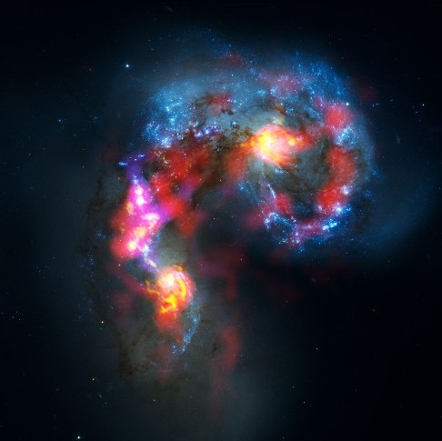 Las imágenes de las galaxias interactuantes Antennae de los radiotelescopios de ALMA, combinada con la del Telescopio Espacial Hubble. Foto: ALMA - HST.