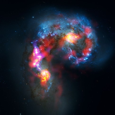 Las im�genes de las galaxias interactuantes Antennae de los radiotelescopios de ALMA, combinada con la del Telescopio Espacial Hubble. Foto: ALMA - HST.