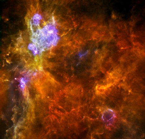 Imagen de infrarrojo en colores asignados de la nube molecular W3. Crdito: ESA/Herschel.
