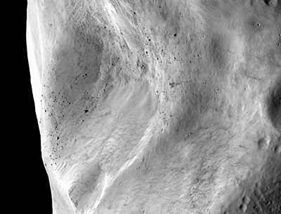 Ilustracin de la sonda Dawn de la NASA, frente a Vesta y Ceres.